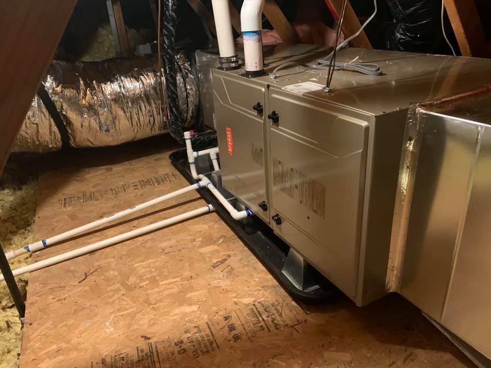 Bryant furnace installed in attic with drain lines and drain pan by RPM HVAC Service Inc.