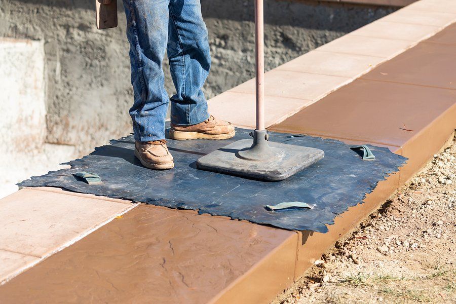 drying the wet concrete path walk