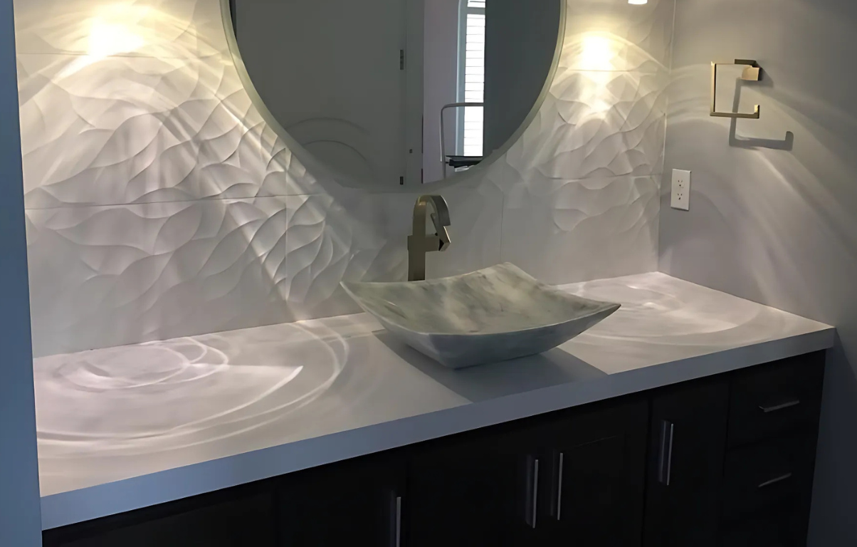 Modern bathroom vanity with white textured wall, round mirror, and vessel sink.
