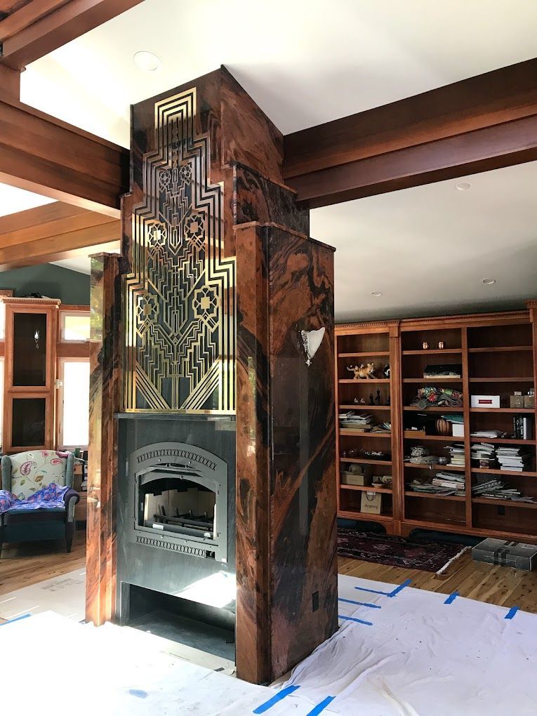 There is a fireplace in the middle of the room.