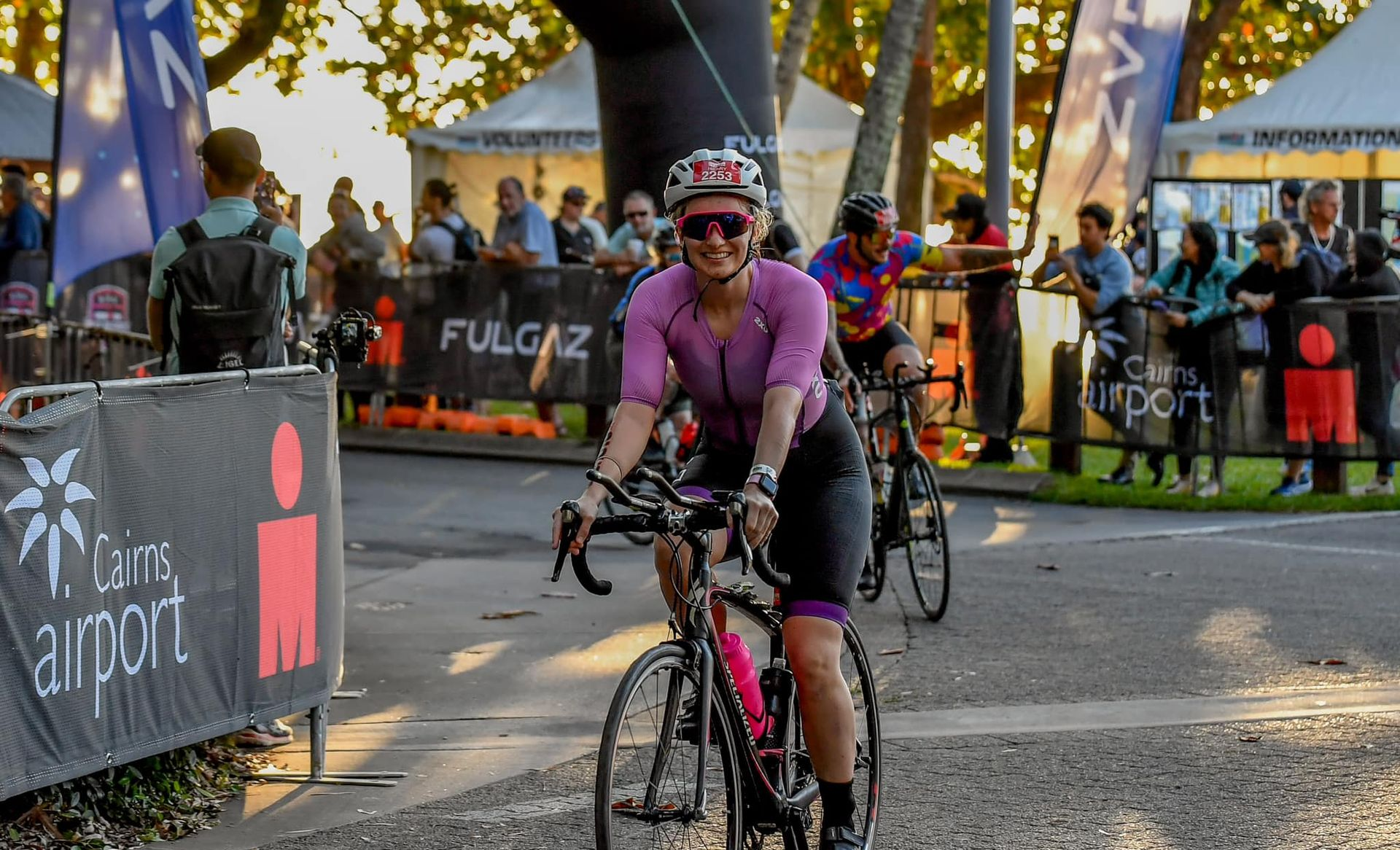 Woman Cycling in an Ironman Race; Smiling — Amanda Jade Photography In Port Douglas, QLD