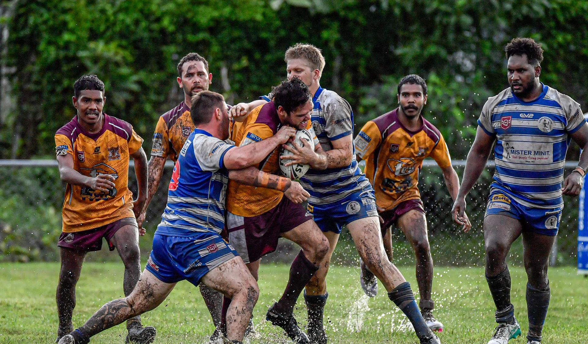 Rugby Players in Muddy Uniforms — Amanda Jade Photography In Gordonvale, QLD