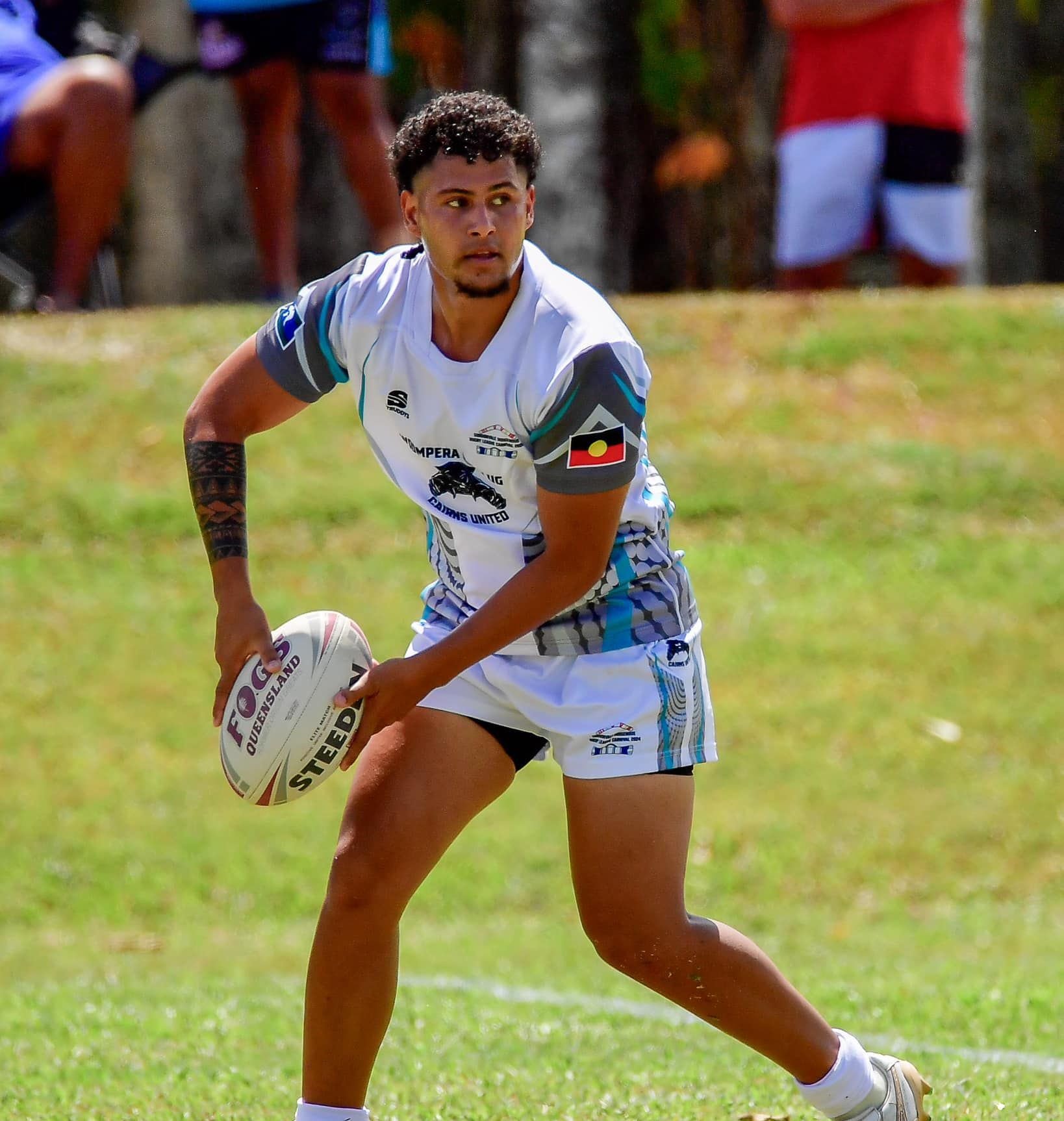 Man in White and Blue Jersey — Amanda Jade Photography In Gordonvale, QLD