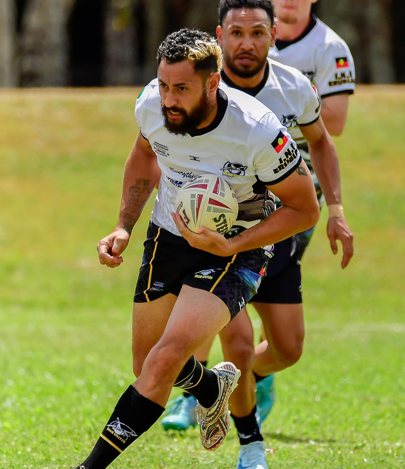 Rugby Player Running With the Ball — Amanda Jade Photography In Gordonvale, QLD