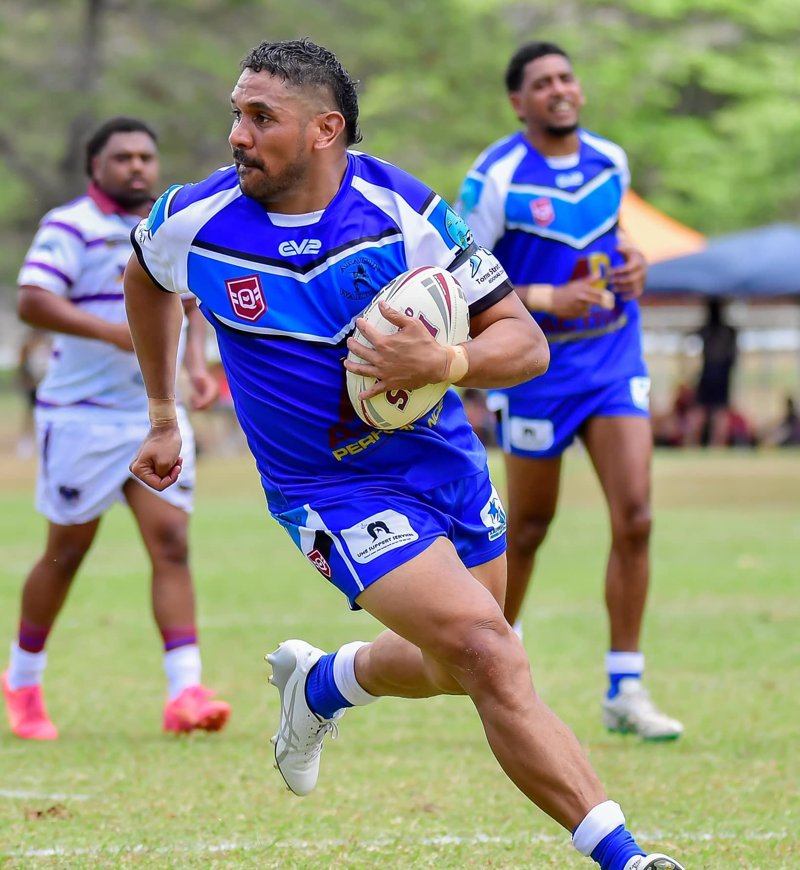Rugby Player in Blue and White Uniform — Amanda Jade Photography In Gordonvale, QLD