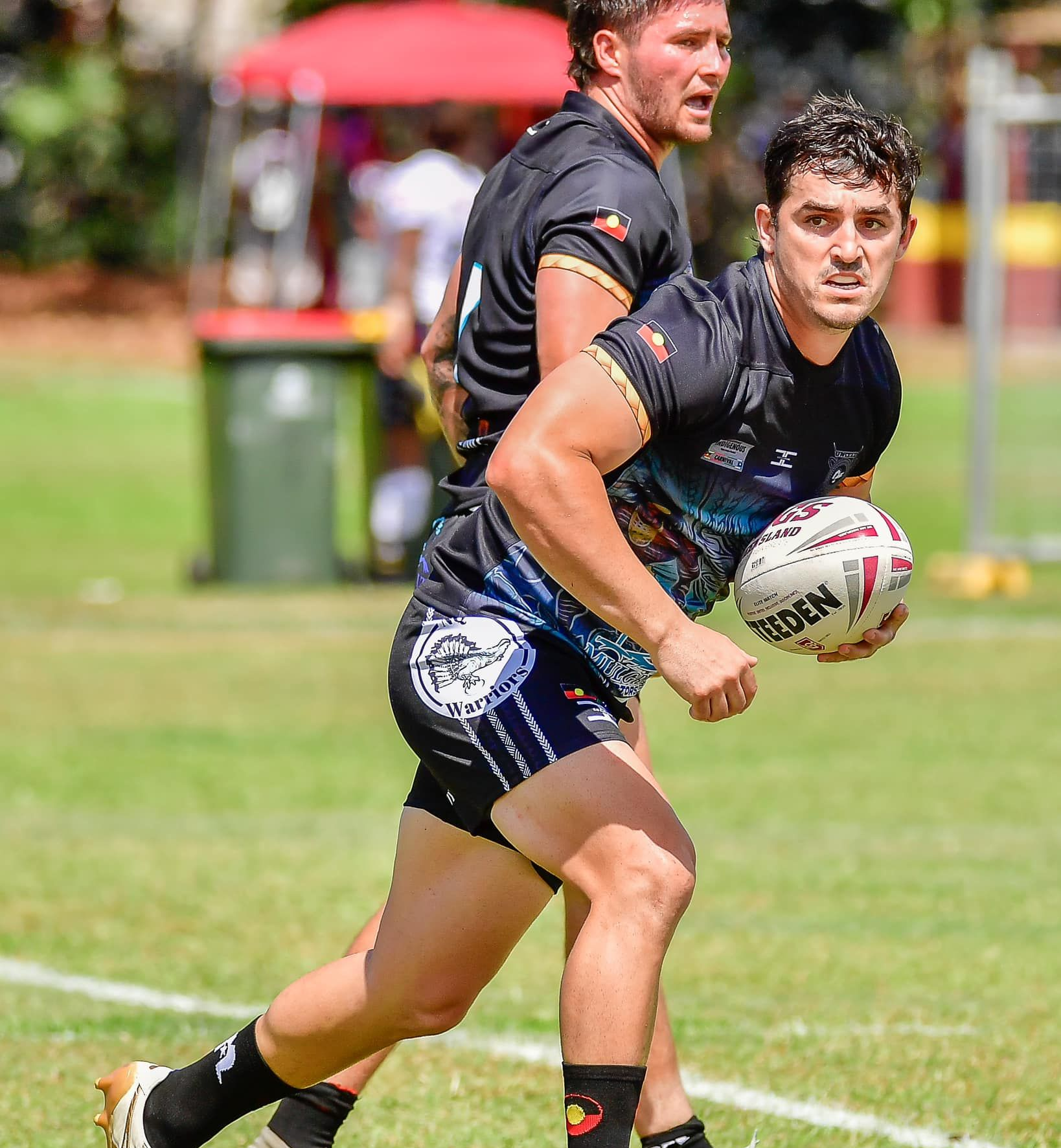 Rugby Players on a Grassy Field — Amanda Jade Photography In Gordonvale, QLD