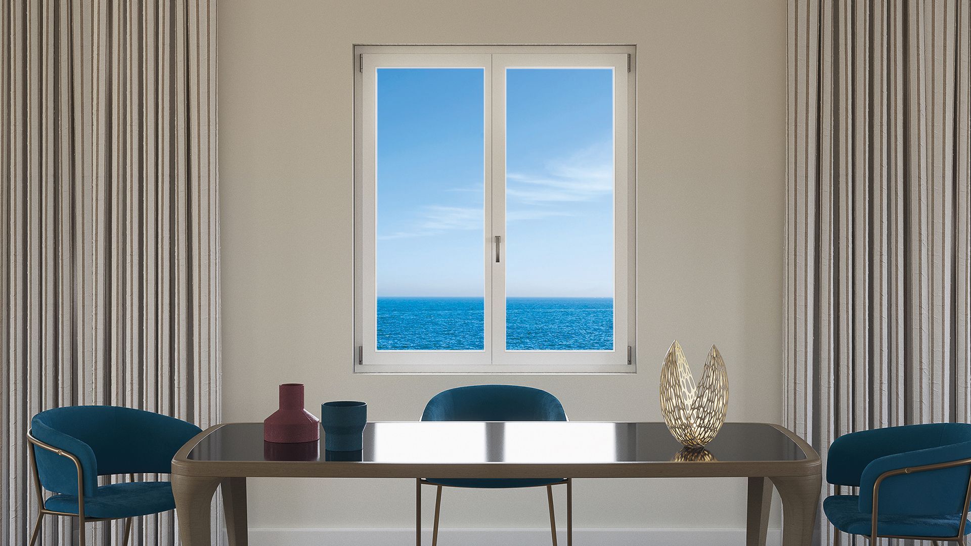 Sala da pranzo moderna con sedie blu, un tavolo e una finestra con vista sull'oceano.