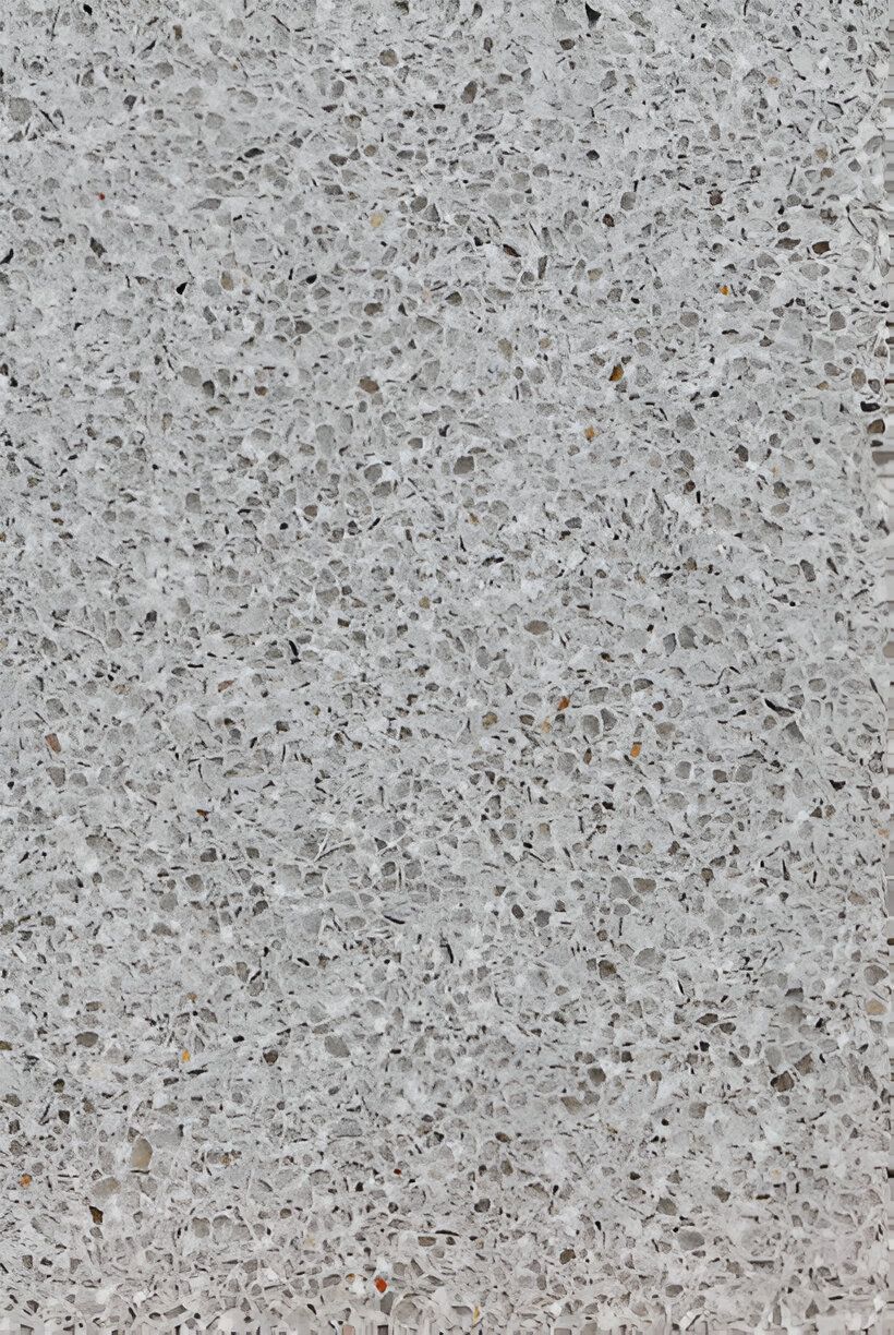 A close up of a gray granite counter top.