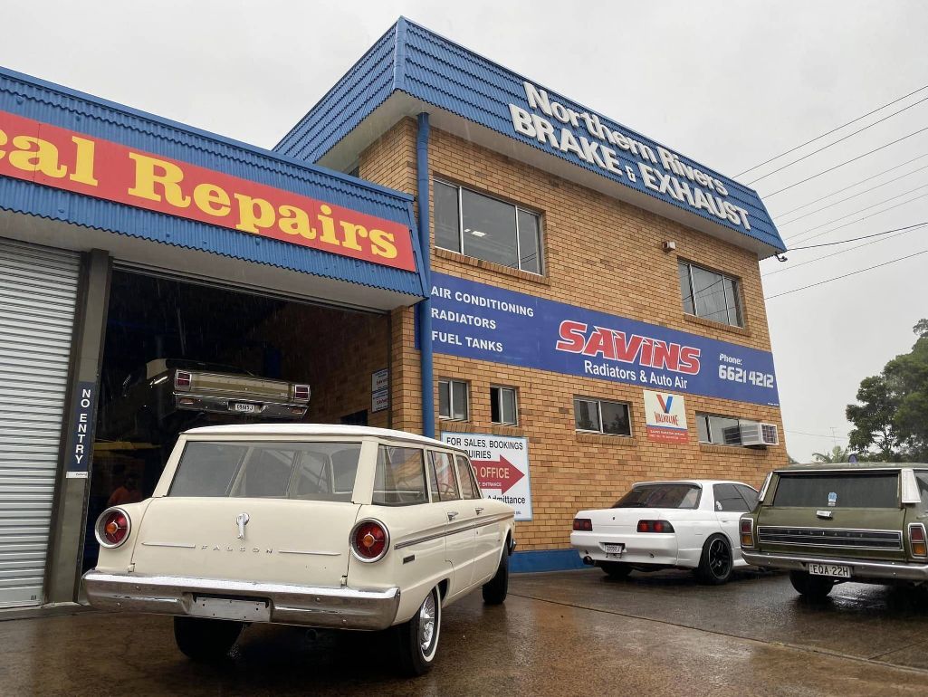 A White Van is Parked in Front of a Building — Savins Radiator Service In Lismore, NSW