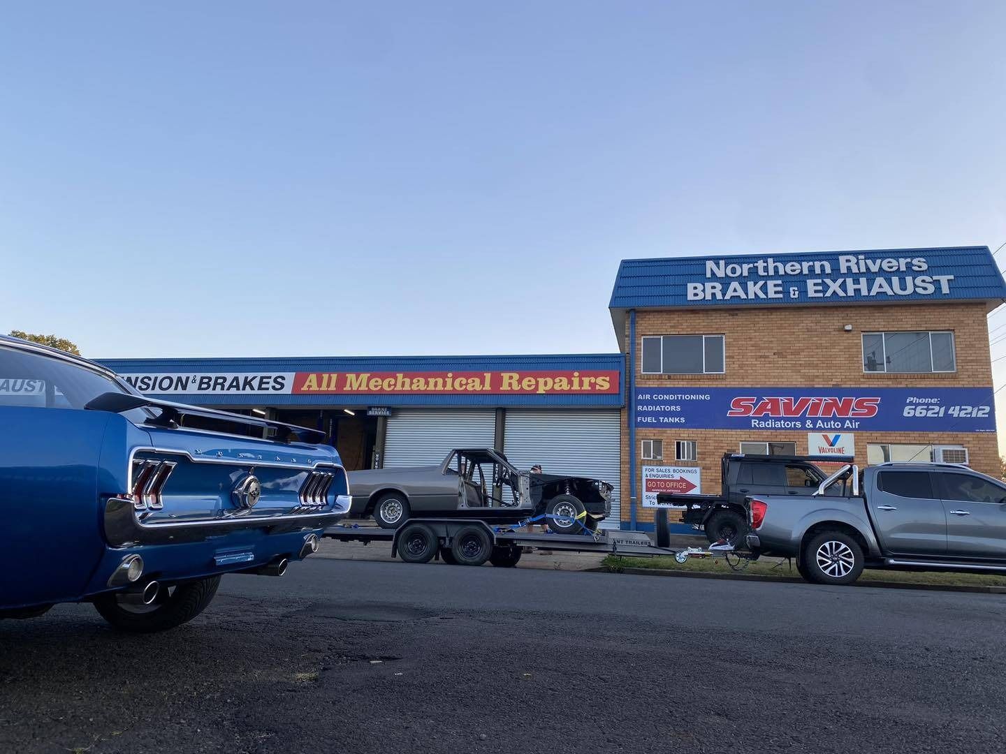 A Blue Truck is Parked in Front of a Building — Savins Radiator Service In Lismore, NSW