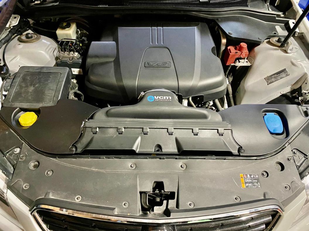 The Engine of a Car is Visible Under the Hood — Savins Radiator Service In Yamba, NSW