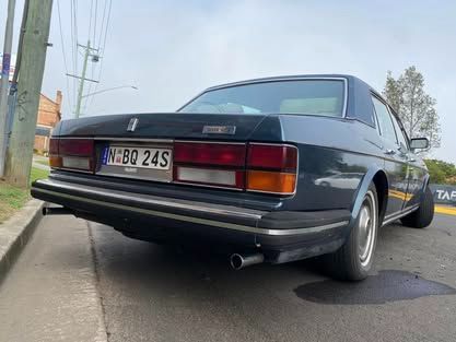A Black Car With a License Plate — Savins Radiator Service In Casino, NSW