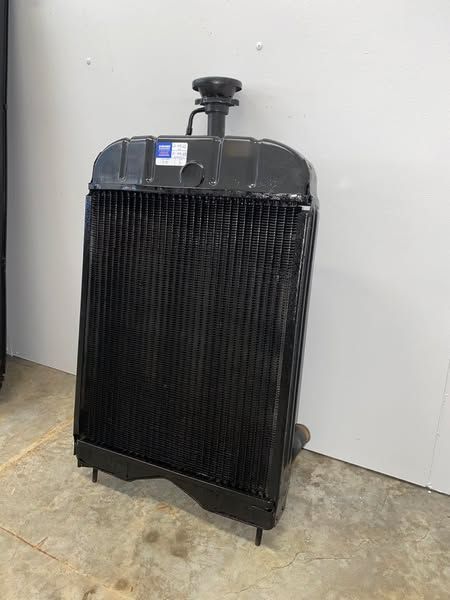A Radiator is Sitting on the Floor Next to a Wall — Savins Radiator Service In Yamba, NSW