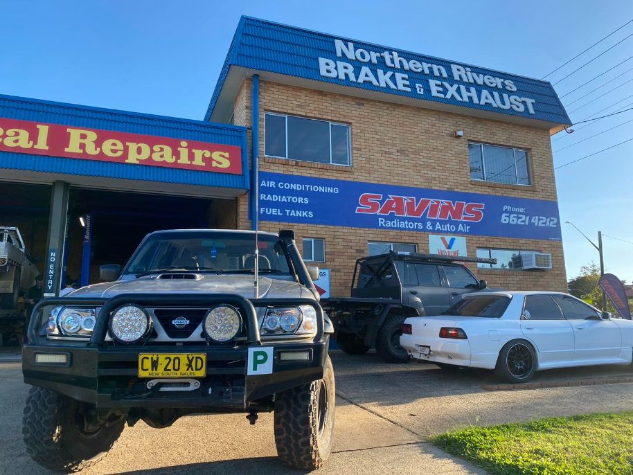 A Truck is Parked in Front of a Car Repair Shop — Savins Radiator Service In Lismore, NSW