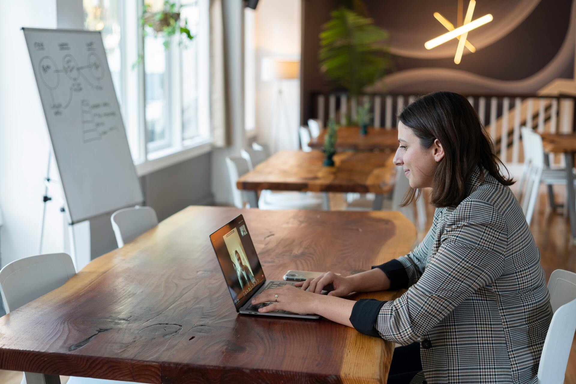 Lady working alone with a laptop