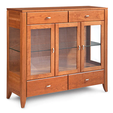 A wooden cabinet with glass doors and drawers
