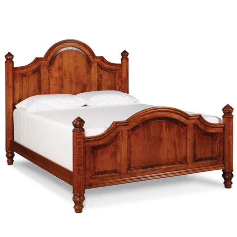 A wooden bed with white sheets and pillows on a white background