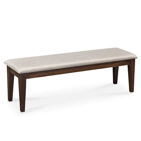 A wooden bench with a white cushion on a white background.