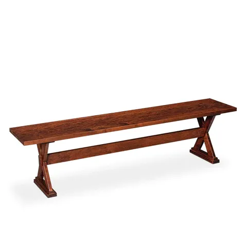 A wooden bench is sitting on a white surface.