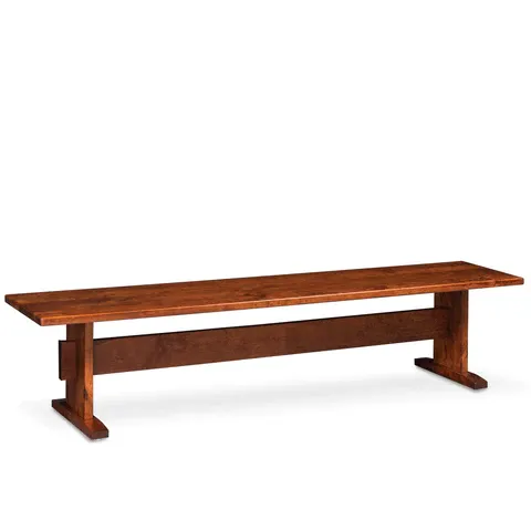 A wooden bench is sitting on a white surface.