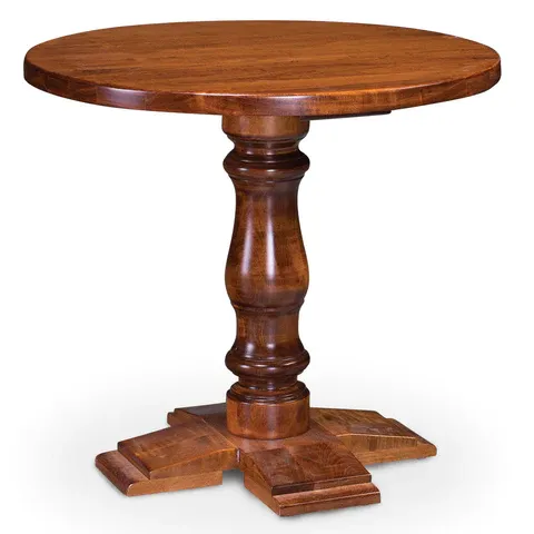 A wooden table with a round top and a wooden base