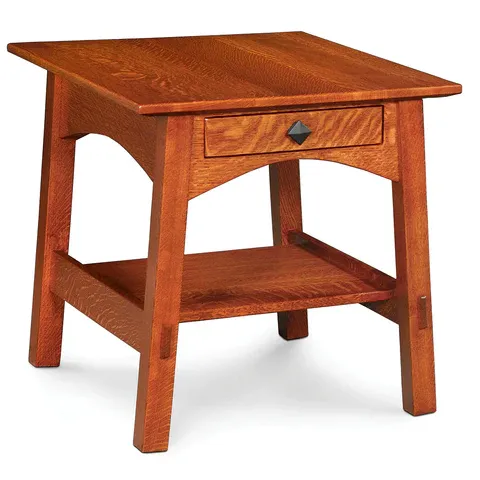 A small wooden table with a drawer underneath it