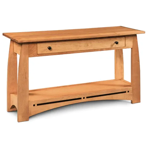 A wooden table with two drawers and a shelf