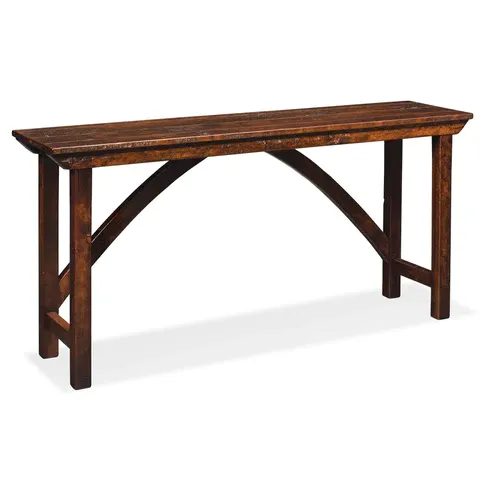 A long wooden table with a white background