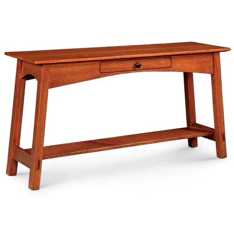 A wooden table with a drawer underneath it