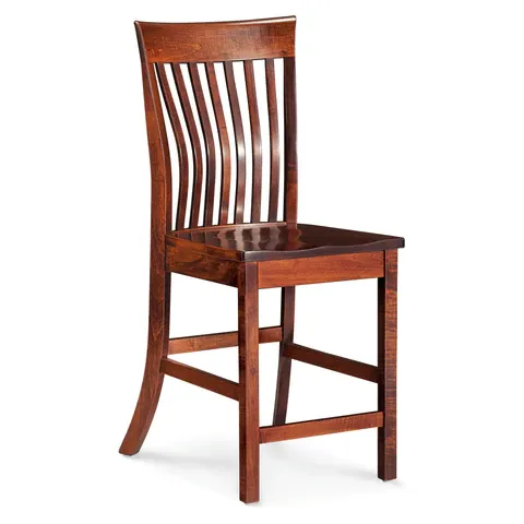A wooden chair with a curved back on a white background
