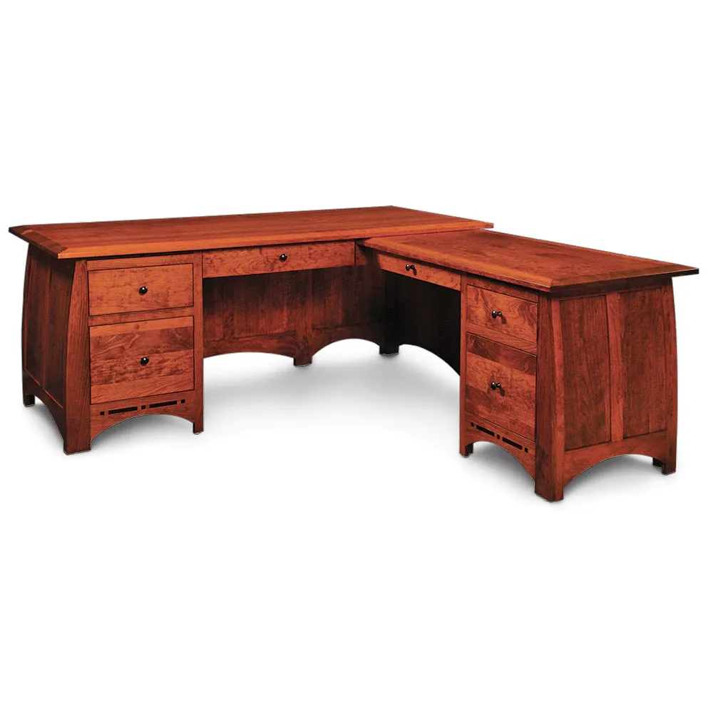 A wooden desk with drawers and a filing cabinet