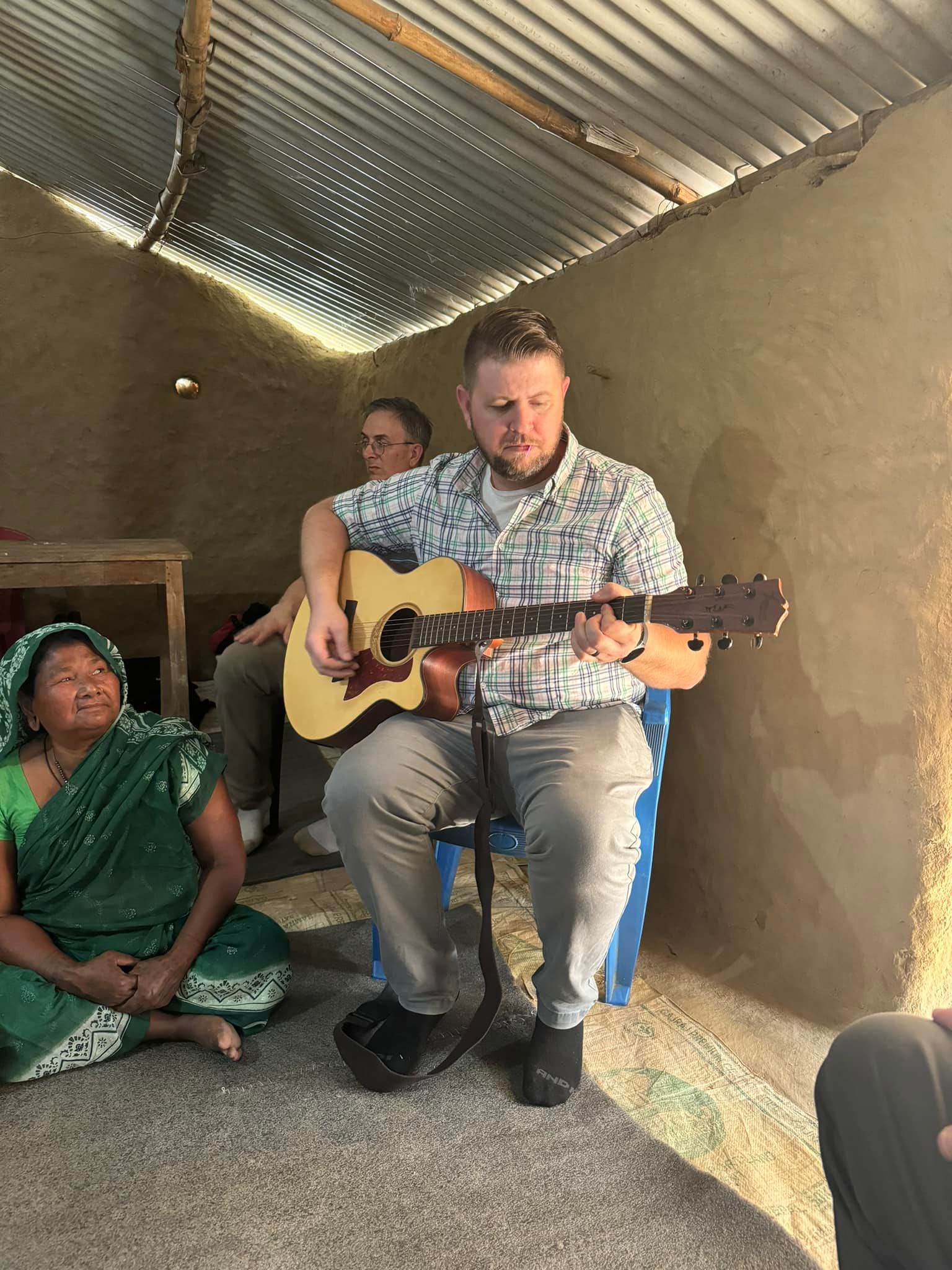 gentleman playing guitar
