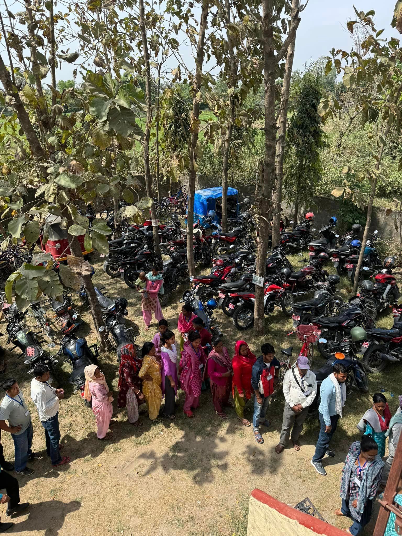 bicycles and motor cycles; the recipient of those wheels; waiting in line patiently