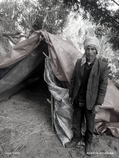 earthquake victims; tents; damaged houses