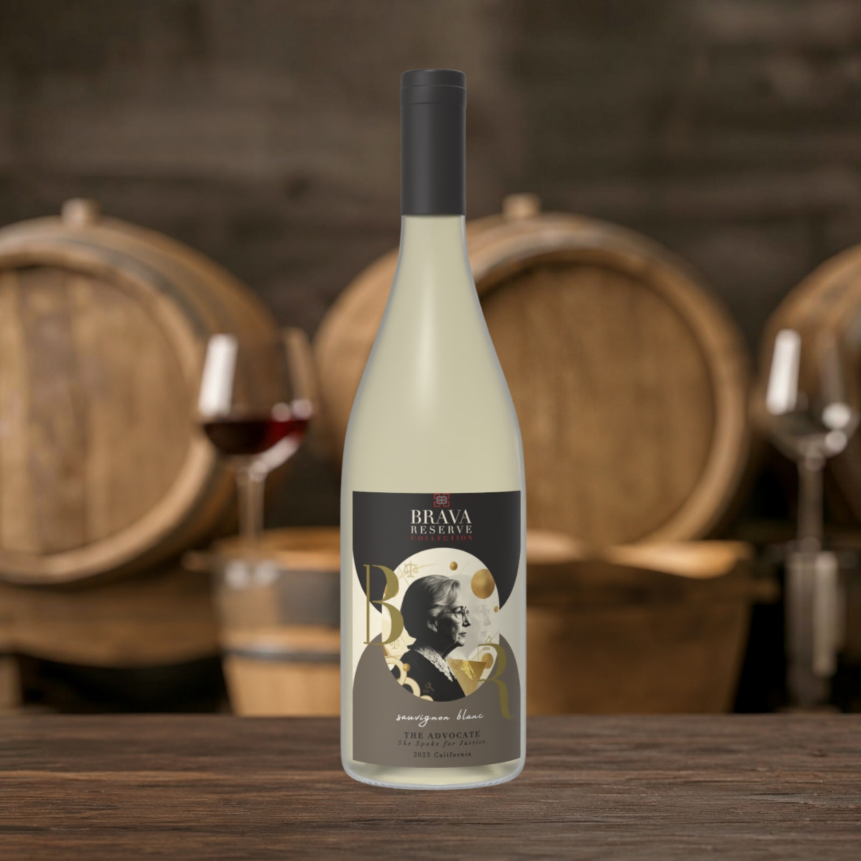 Bottle of white wine on a wooden table with wine barrels and glasses in the background