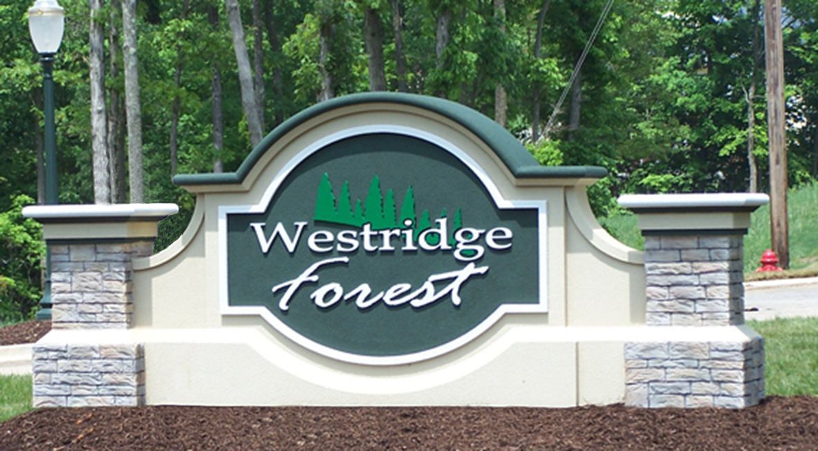 Materials commonly used in monument sign construction in Mohawk, TN including stone, brick, concrete, cast stone, aluminum, stainless steel, acrylic, polycarbonate, high-density foam cores, wood accents, and composite panels with LED lighting by Tennessee Sign Company.