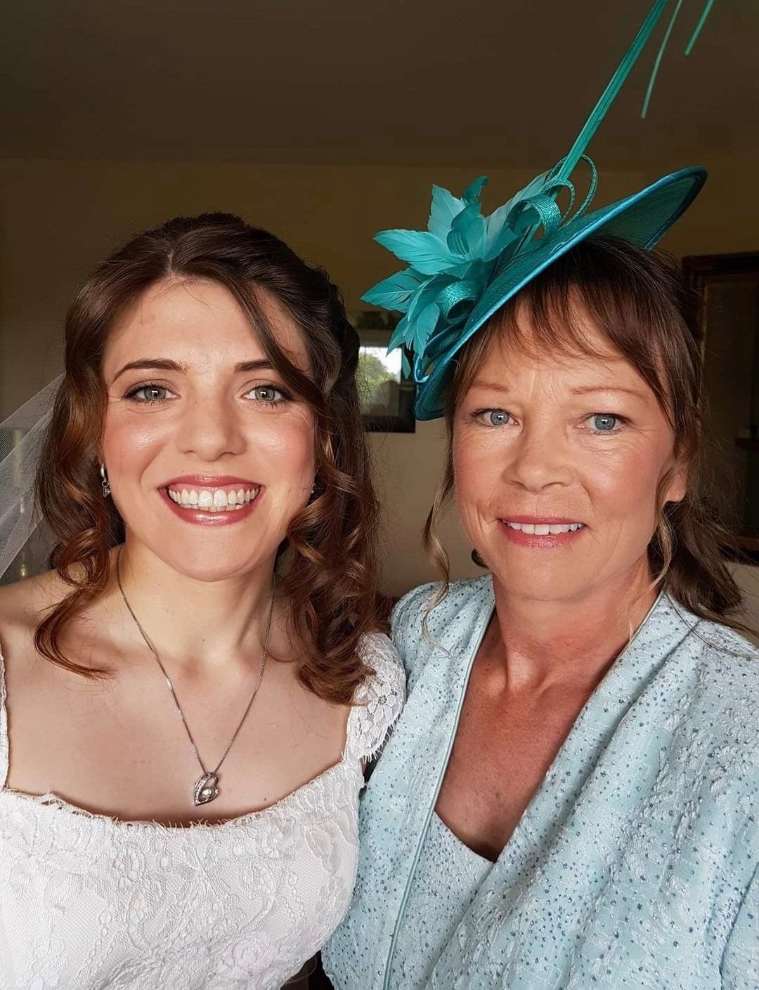 Bride smiling at camera