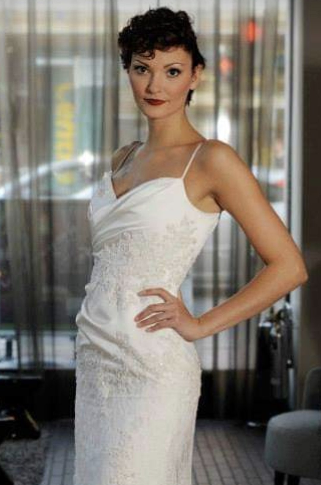 Slim bride with short do and strong make-up
