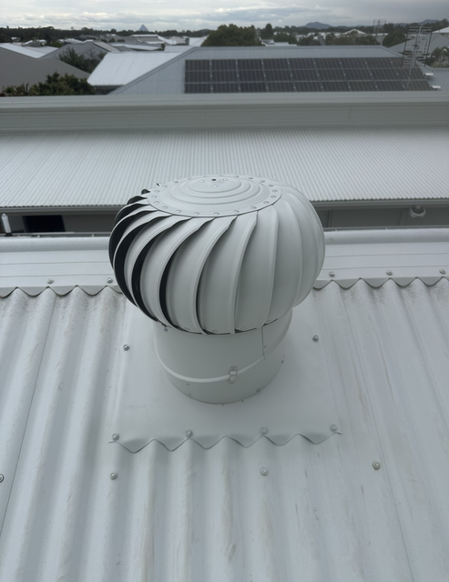 A Whirly Birdt on a Corrugated Metal Roof — Whirly Bird King in Buderim, QLD