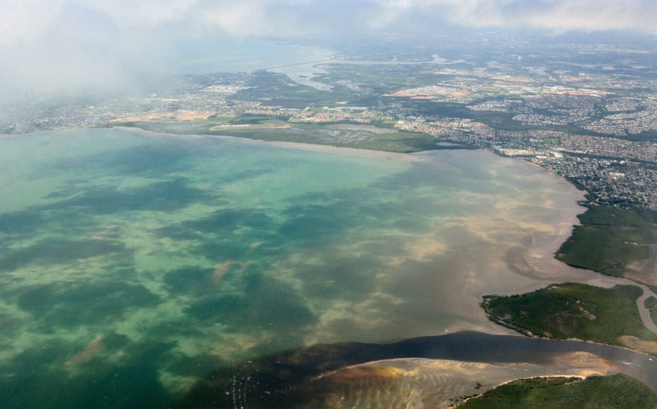 An Aerial View of a Large Body of Water With a City in the Background — Whirly Bird King In Mango Hill, QLD