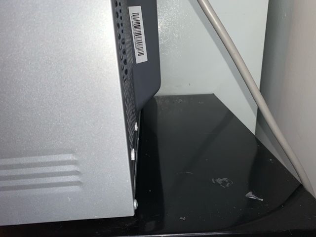 A computer tower with a barcode on the side of it