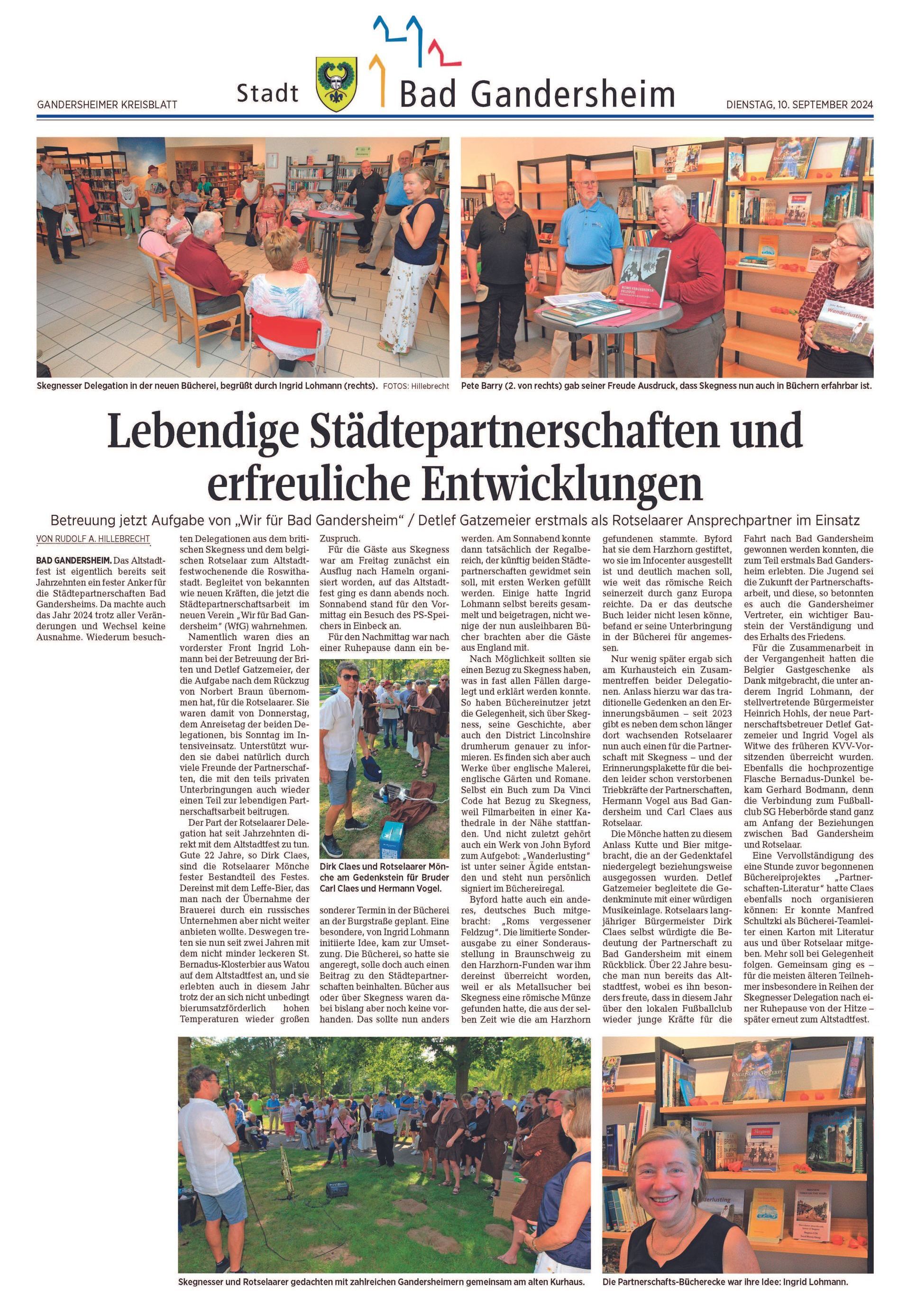 Zeitungsseite mit Text und Fotos über städtische Partnerschaften und Entwicklungen in Bad Gandersheim.