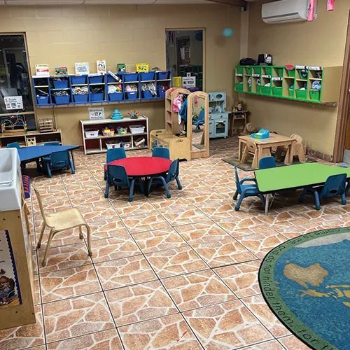 There are many tables and chairs in this room.