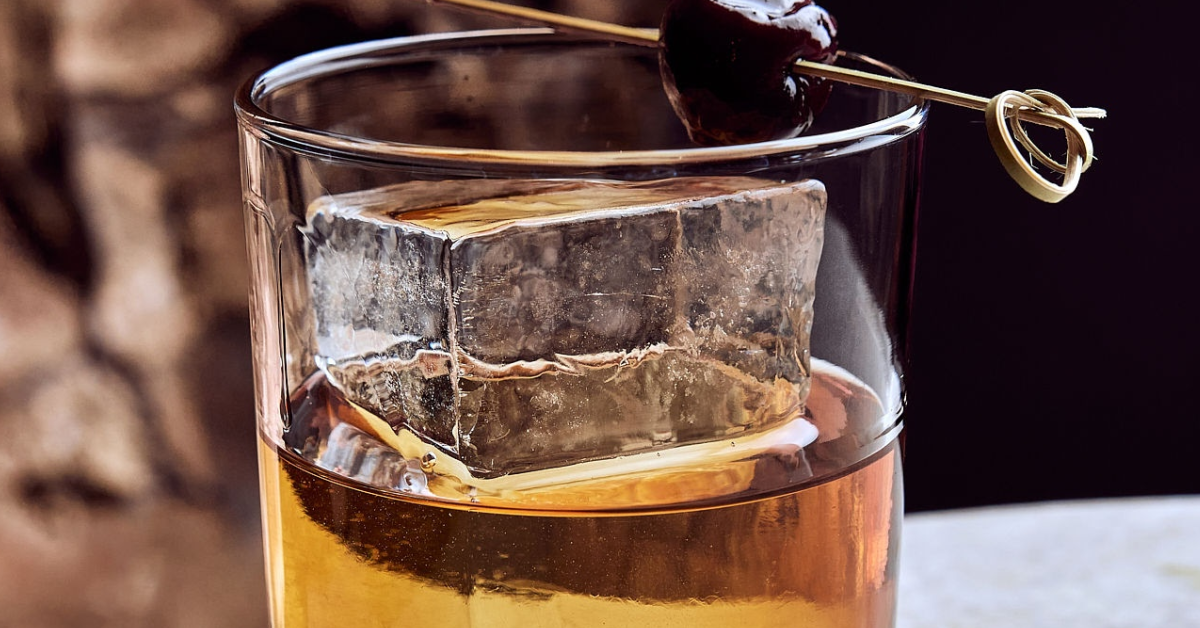 Old-fashioned cocktail with large ice in Prescott Arizona