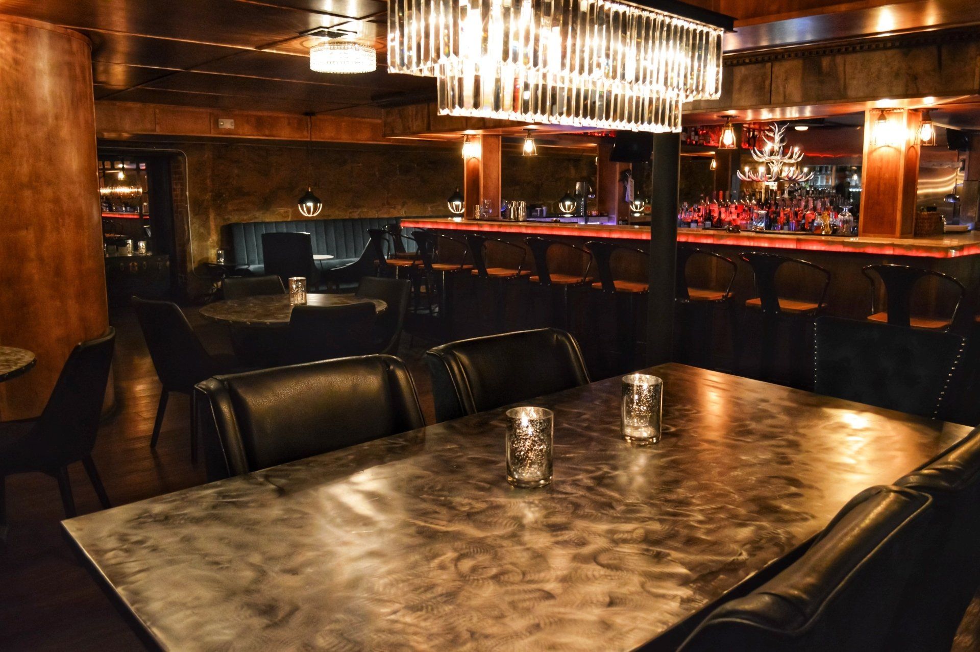 Seating for six or more at tables at The Point bar and lounge cocktail bar in Prescott Arizona 