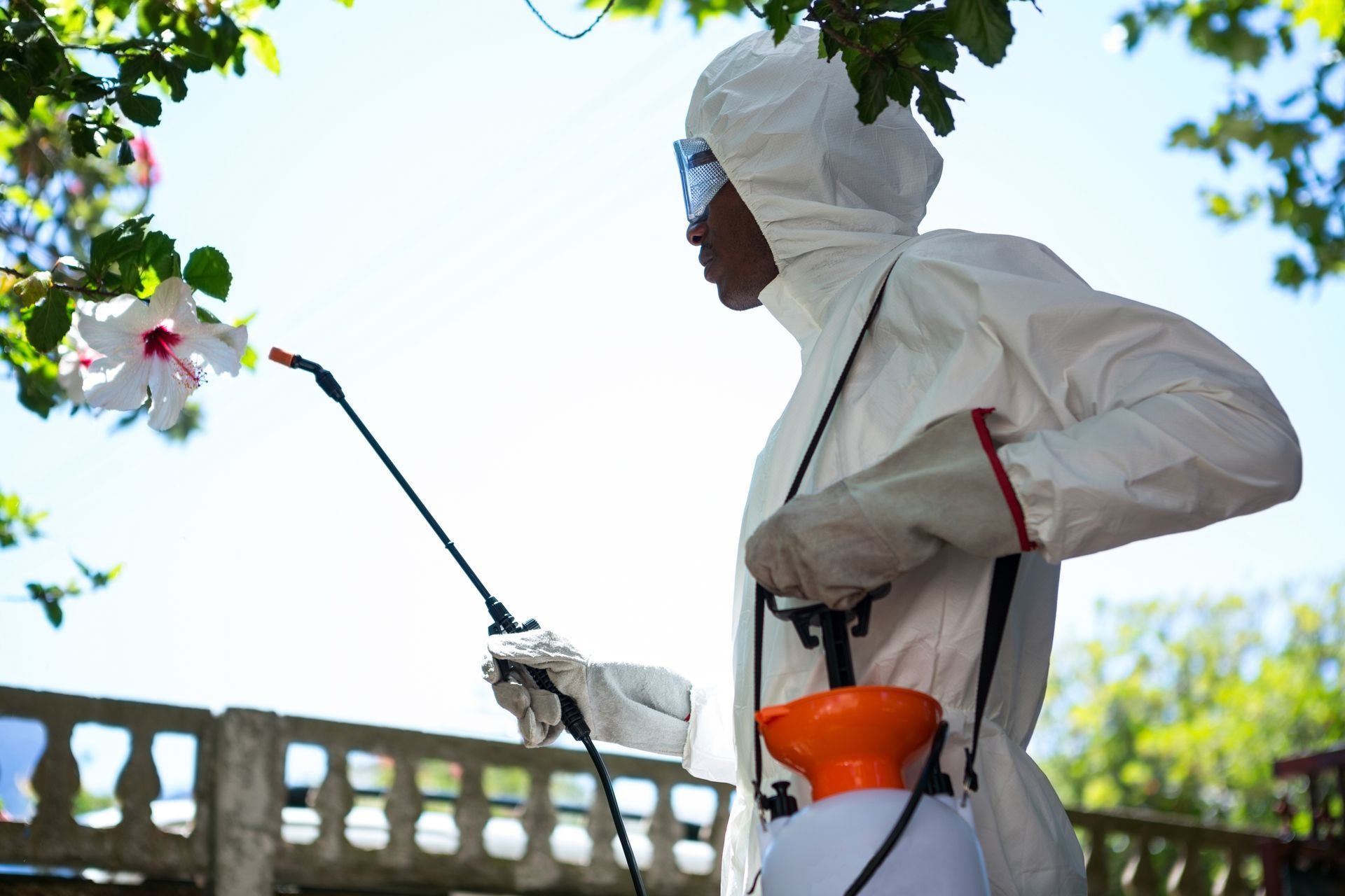 Senior environmental technician working a containment area on a St. Louis job site.