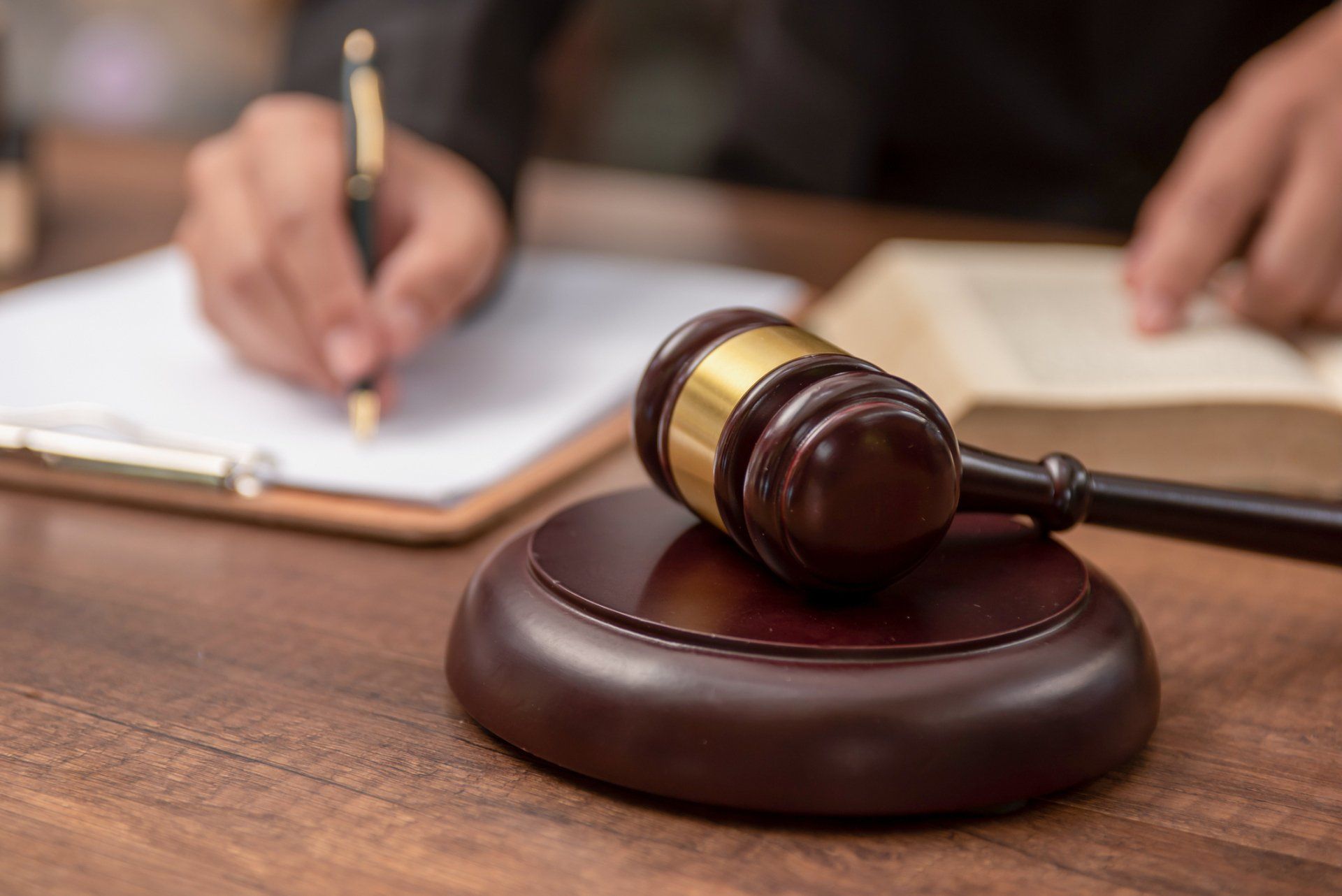 Lawyer Working With Contract Papers — High Point, NC – Truman Barker