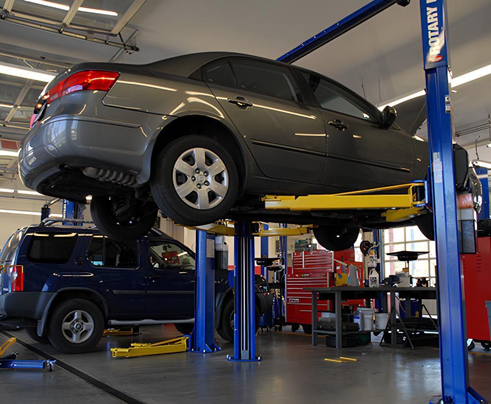 Vehicle Lifted in Service Bay for Undercarriage Inspection | Japan Auto Care