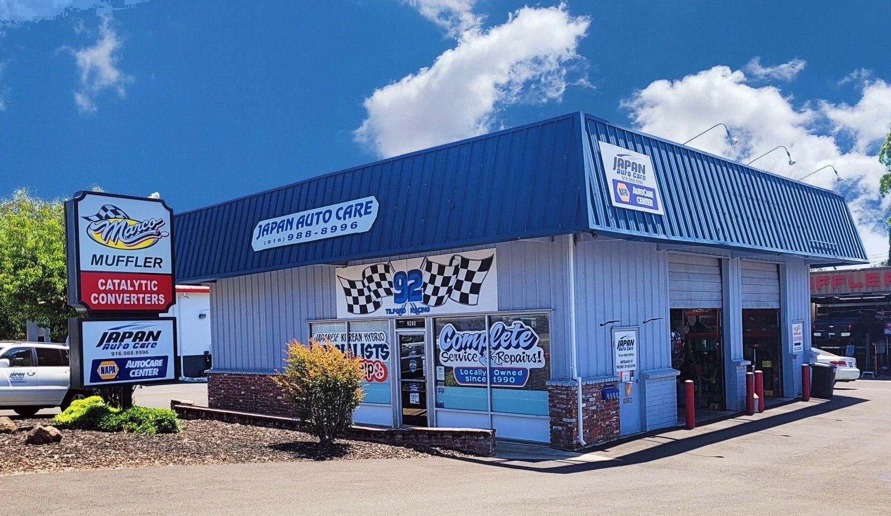 Front View of Japan Auto Care with Signage and Blue Roof | Japan Auto Care