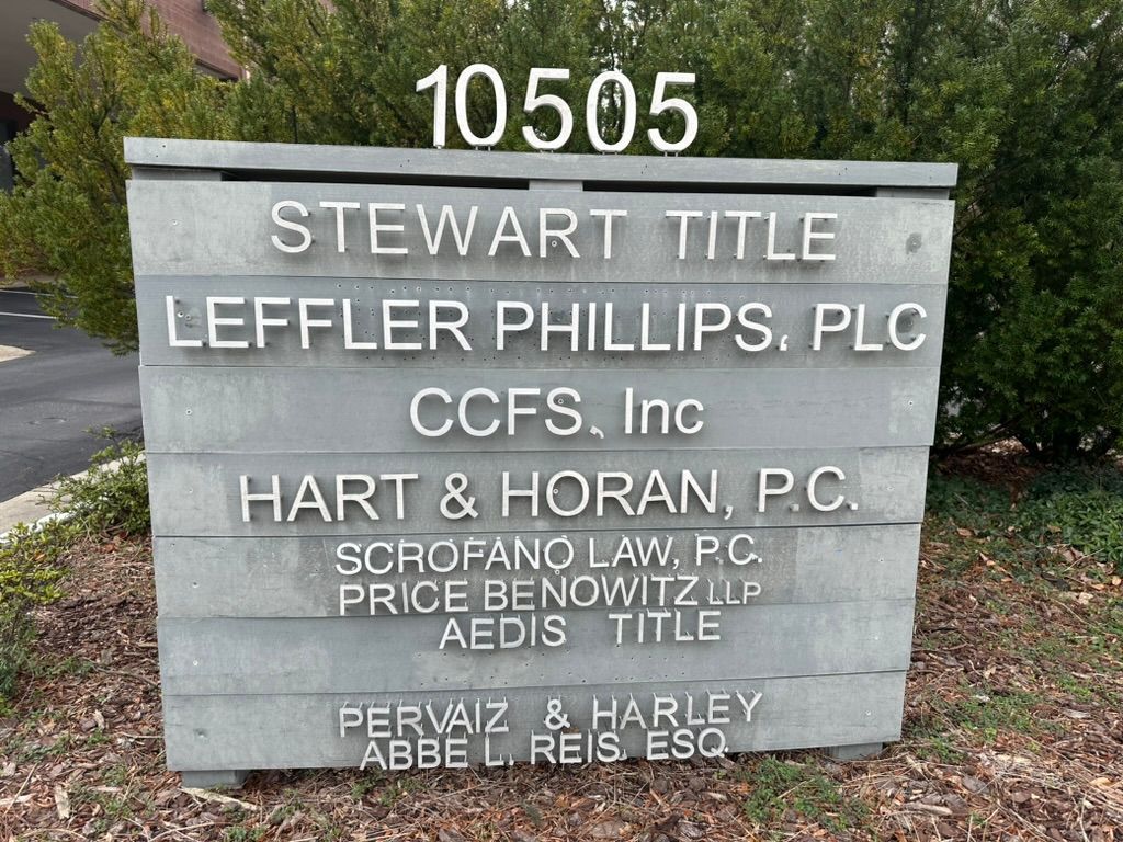 A sign for stewart title leffler phillips plc